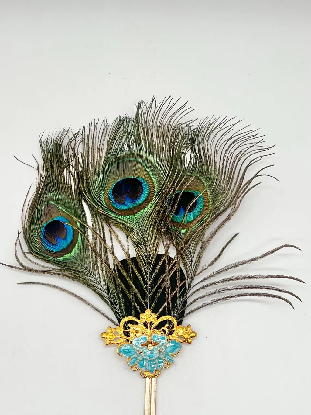 11 inch Elegant Oshun Peacock Feather Fan / Abanico elegante de 11 pulgadas con plumas de pavo real de Oshun.